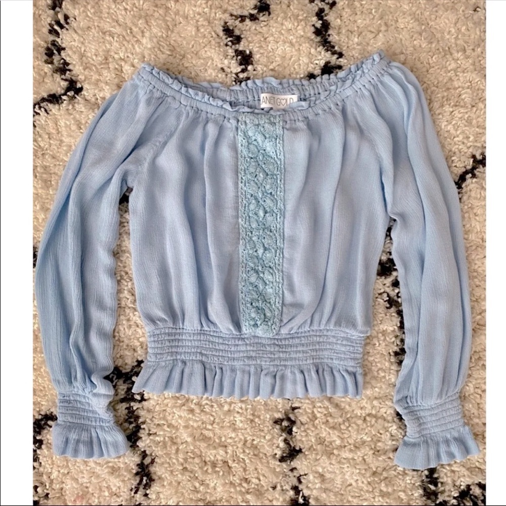 Blue blouse.